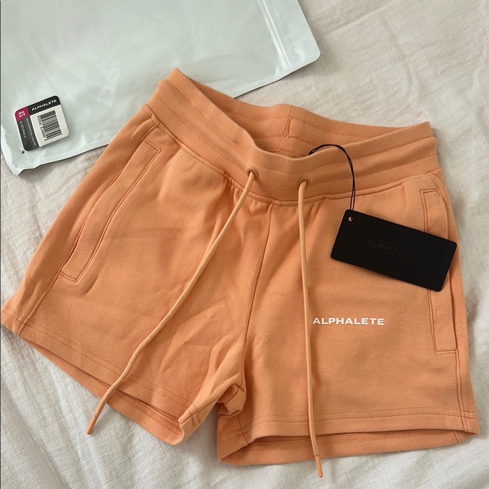 Alphalete Women's Orange Frost Athletic Shorts